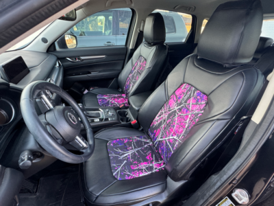 2019 Mazda CX-5 front seat covers with Sirphis Muddy Girl camouflage inserts and Black Sof-Touch trim