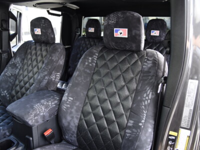 <b>
2008 Jeep Wrangler
</b>
<br>
Insert: Black Ostrich E01 Diamond (Sim. Leather)
</br> Trim: Kryptek Typhon C71 (Canvas)
</br>Product: Camo - Gold Series | Covers and Camo