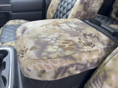 2023 Chevy Silverado 1500 center console cover with Kryptek Highlander fabric and Black Sof-Touch Diamond seat covers