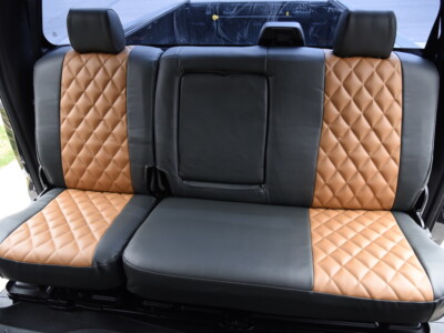 2008 Ford F-350 rear leatherette seat covers in Caramel Sof-Touch diamond and Charcoal Sof-Touch trim