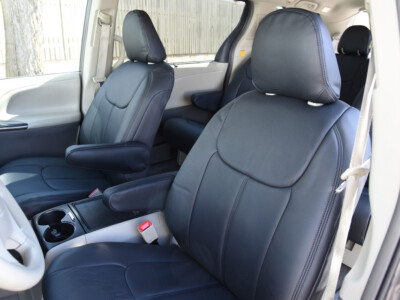 2012 Toyota Sienna front seat covers with Black Perforated Leather inserts with Black Vinyl trim and Black Stitch
