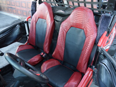 <b>
2015 Polaris RZR 
</b>
<br>
Insert: Black Ostrich E01 (Sim. Leather)
</br>Trim: Flame Croc E44 (Sim. Leather) 
<br> Product: UTV </br> | Covers and Camo