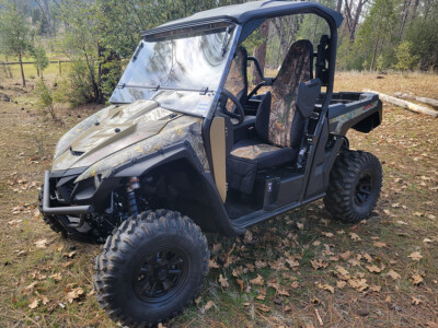 2022 Yamaha Wolverine exterior view with Realtree Xtra and Black HD1000 UTV camo seat covers