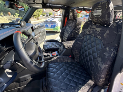 <b>
2023 Ford Bronco Raptor
</b>
<br>
Insert: Black Ostrich E01 Diamond (Sim. Leather)
</br>Trim: MultiCam Black C80 (Canvas)
<br> Product: Exotic - Gold Series </br> | Covers and Camo