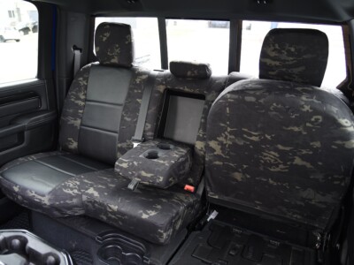 <b>
2023 RAM 2500
</b>
<br>
Insert: Black Perforatred Sof-Touch L01 (Sim. Leather)
</br>Trim: MultiCam Black C80 (Canvas)
</br>Product: Camo - Gold Series | Covers and Camo