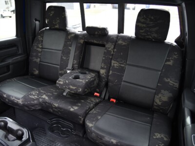 <b>
2023 RAM 2500
</b>
<br>
Insert: Black Perforatred Sof-Touch L01 (Sim. Leather)
</br>Trim: MultiCam Black C80 (Canvas)
</br>Product: Camo - Gold Series | Covers and Camo