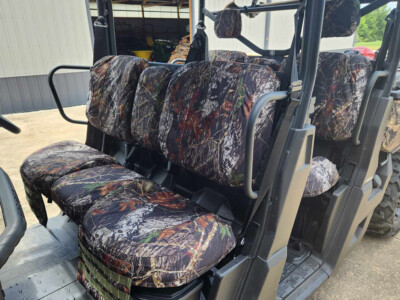 2023 Can-Am Defender front UTV camo seat covers in Mossy Oak New Break-Up camouflage