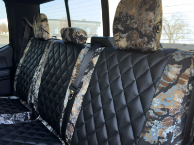 2018 Ford F-350 rear seat covers in Kryptek Skyfall camouflage and black diamond Sof-Touch