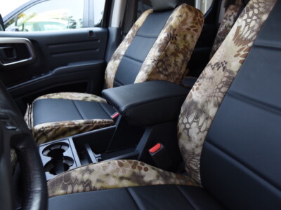 2013 Honda Ridgeline interior with center console and Kryptek Highlander seat covers