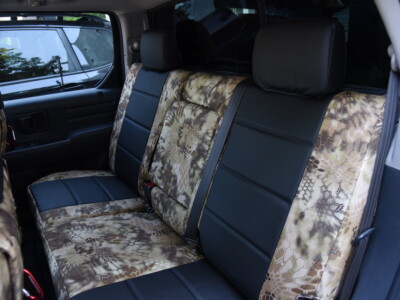 <b>
2013 Honda Ridgeline
</b>
<br>
Insert: Black Sof-Touch S01 (Sim. Leather)
</br>Trim: Kryptek Highlander C70 (Canvas)
<br> Product: Camo - Gold Series </br> | Covers and Camo