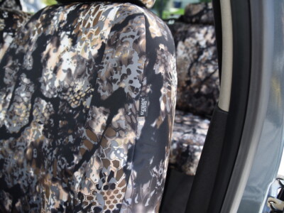 Close-up of Kryptek Skyfall camouflage seat cover texture in a 2013 Chevy Silverado 1500
