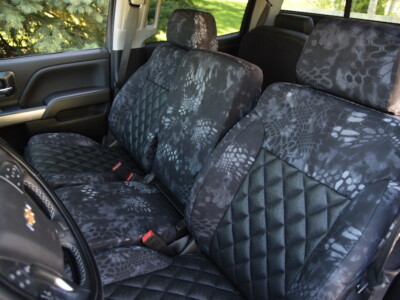 <b>2019 Chevy Silverado 3500
</b><br>
Insert: Black Ostrich E01 Diamond (Sim. Leather)
</br>Trim: Kryptek® Typhon™ C71 (Canvas)
<br>Product: Camo - Gold Series </br> | Covers and Camo