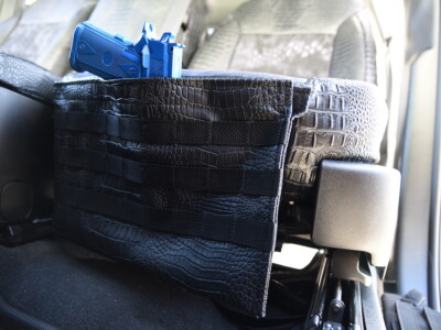 2025 GMC Sierra 3500 Kryptek Typhon seat back with Midnight Croc trim and MOLLE gun pocket