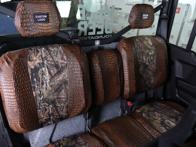 2026 Can-Am Defender rear seat back UTV exotic seat covers with Mossy Oak NB Country inserts, Java Croc trim, and custom logo patches