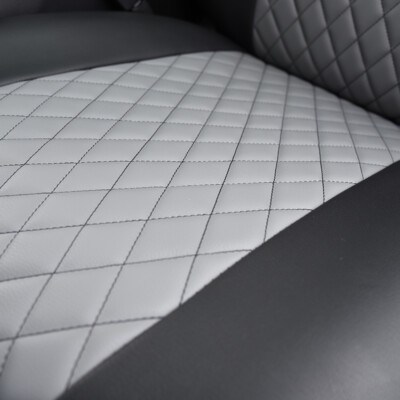 <b>
2022 RAM 1500
</b>
<br>
Insert: Light Gray Faux Leather Diamond Stitch
</br> Trim: Black Faux Leather
</br>Product: Faux Leather - Silver Series | Covers and Camo