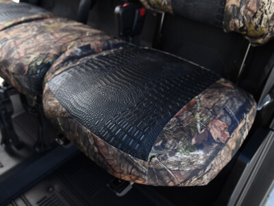 2026 Can-Am Defender | Midnight Croc | Mossy Oak NB Country 2026 Can-Am Defender Midnight Croc seat cushion close-up with Mossy Oak NB Country trim