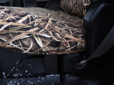 Seat bottom close-up of 2019 Ford F-550 seat covers in Mossy Oak Shadow Grass Blades camouflage
