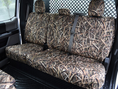 Rear seat view of 2019 Ford F-550 seat covers in Mossy Oak Shadow Grass Blades camouflage