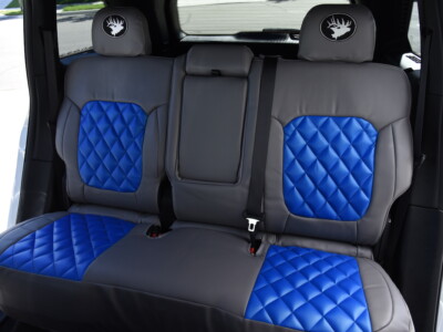 2023 Jeep Grand Cherokee rear seat covers with Blue Leatherette Diamond inserts and Medium Gray Sof-Touch trim
