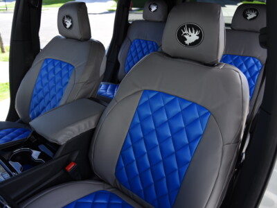 2023 Jeep Grand Cherokee front seat covers with Blue Leatherette Diamond inserts and Medium Gray Sof-Touch trim